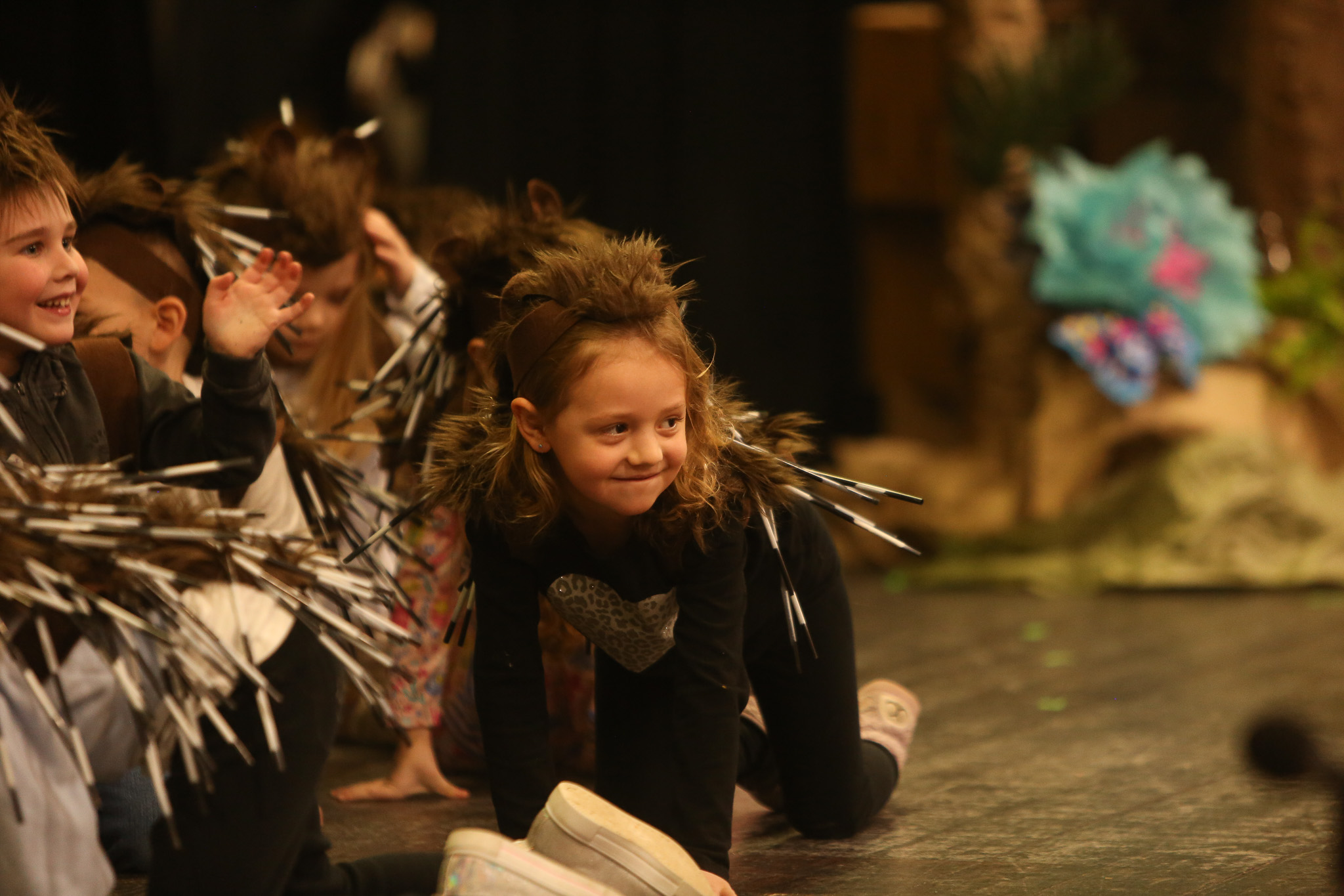 A group of children sitting in a circle in a Christian school classroom.